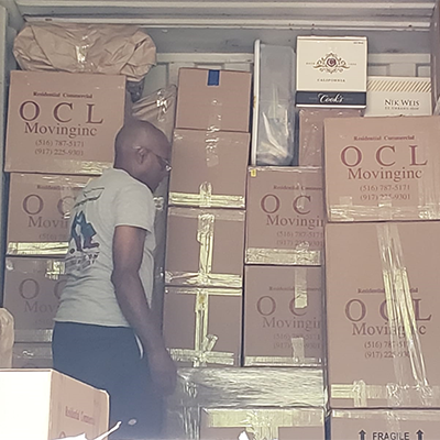 OCL Moving Inc. packing the truck